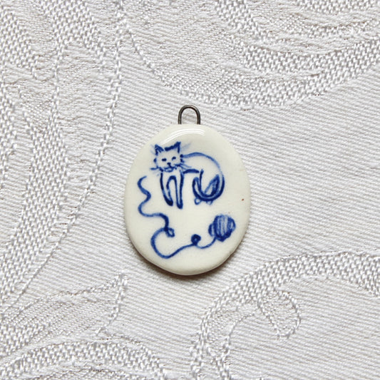 Cat With Yarn Charm