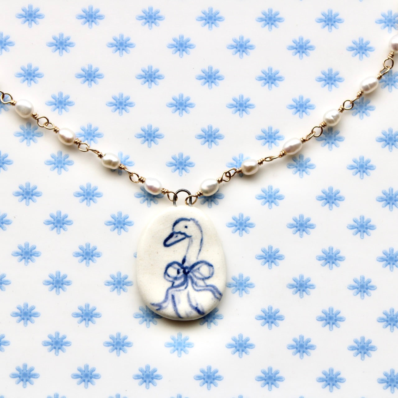 Beaded Chain Goose With Bow Necklace in Gold